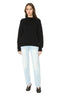 Model wearing Black Merino Wool and Baby Alpaca Turtleneck Jumper