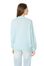 Model wearing a Powder Blue Merino Wool Blend Crew Neck Jumper, back view