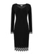 Black dress with lace details on a white background
