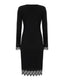 Black dress with lace details on a white background, back view 
