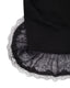Black fabric with lace trim on a white background