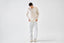 Model wearing cream merino-cashmere blend crew neck jumper, front view.