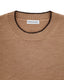 Close-up of a beige merino t-shirt