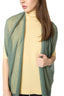 A model wearing a Green Wool Poncho