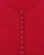 Close-up of red fitted merino wool cardigan showing button-down front and fine knit texture.