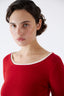 Close-up of model wearing red merino jumper – Roksolana