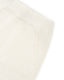 Close-up of ivory merino wool knit shorts showing fine knit texture