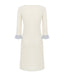 Back view of a merino wool dress with decorative ruffle detailing