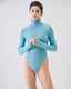 Model wearing a sky blue merino wool turtleneck bodysuit, close-up 